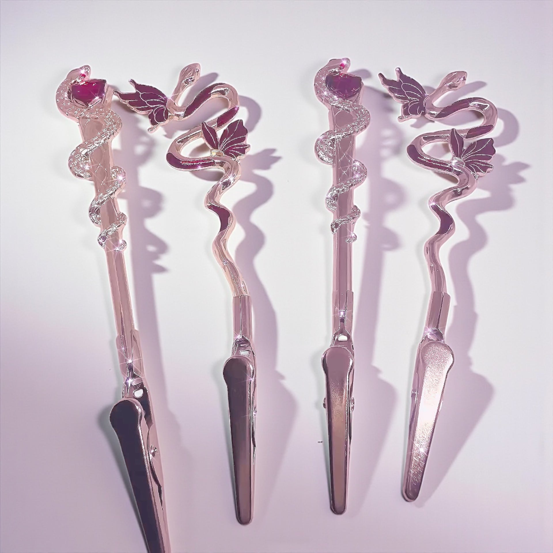 ATM Card Clip Tool featuring a beautiful wire-wrapped design with snake and floral motifs, ideal for long nail lovers and jewelry wearers.