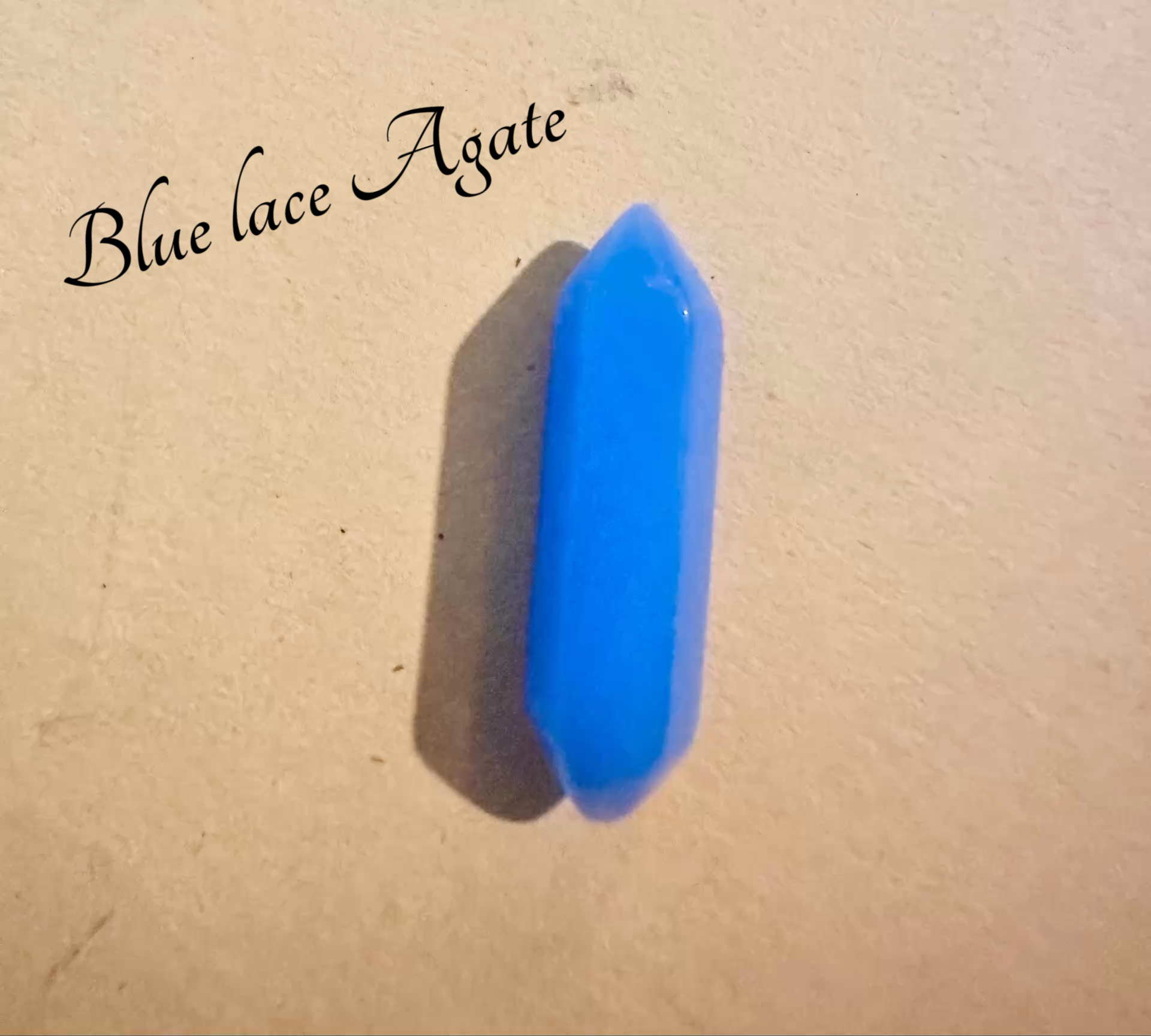 Genuine Gemstone Clip – ATM Card Grabber, & Bracelet Helper featuring a single Blue Lace Agate stone on a plain background.