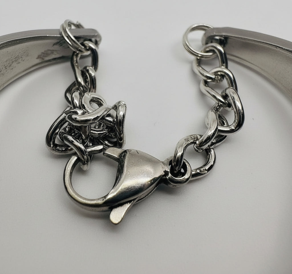 Detail shot of the secure lobster clasp on the Amethyst Spoon Bracelet, showcasing the craftsmanship and adjustable chain option for a perfect fit.