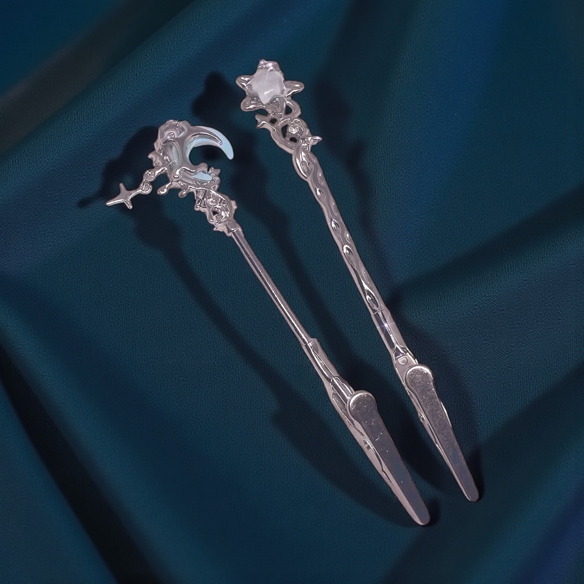 The Bracelet Helper & ATM Card Clip elegantly displayed on dark fabric, showcasing its beautiful mixed metals and decorative accents.