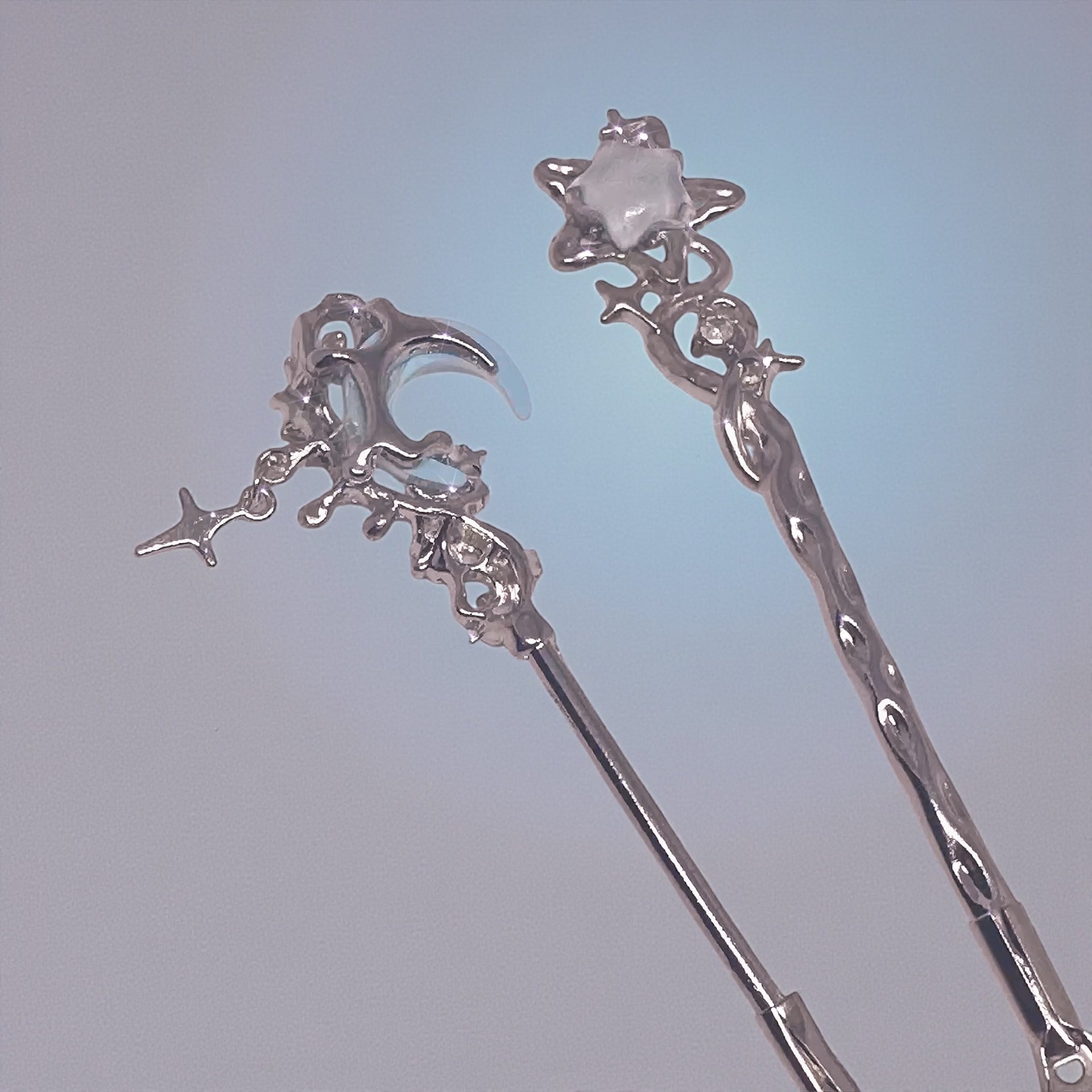 Artistic view of the Bracelet Helper & ATM Card Clip with star and moon motifs, emphasizing its handmade quality and elegant design.