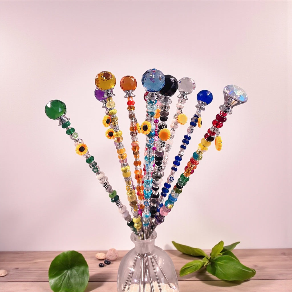 Colorful Garden Fairy Wands displayed in a vase, a perfect plant lover gift idea that adds whimsy to any garden or indoor space.