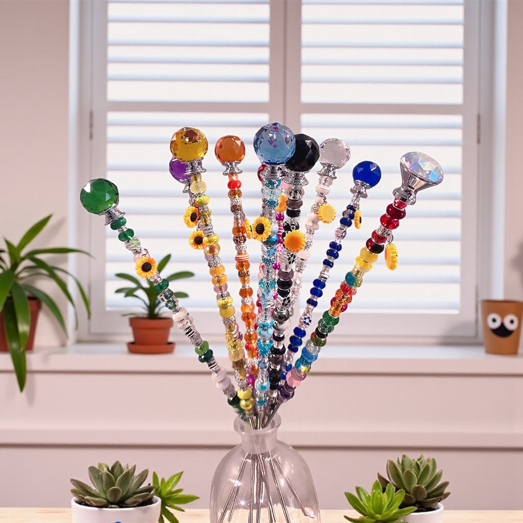 Vibrant Garden Fairy Wands in a bright room, showcasing their decorative design and charm, making them excellent gifts for plant lovers.