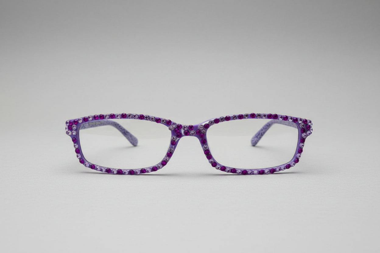 Purple decorative eyeglasses on a textured surface