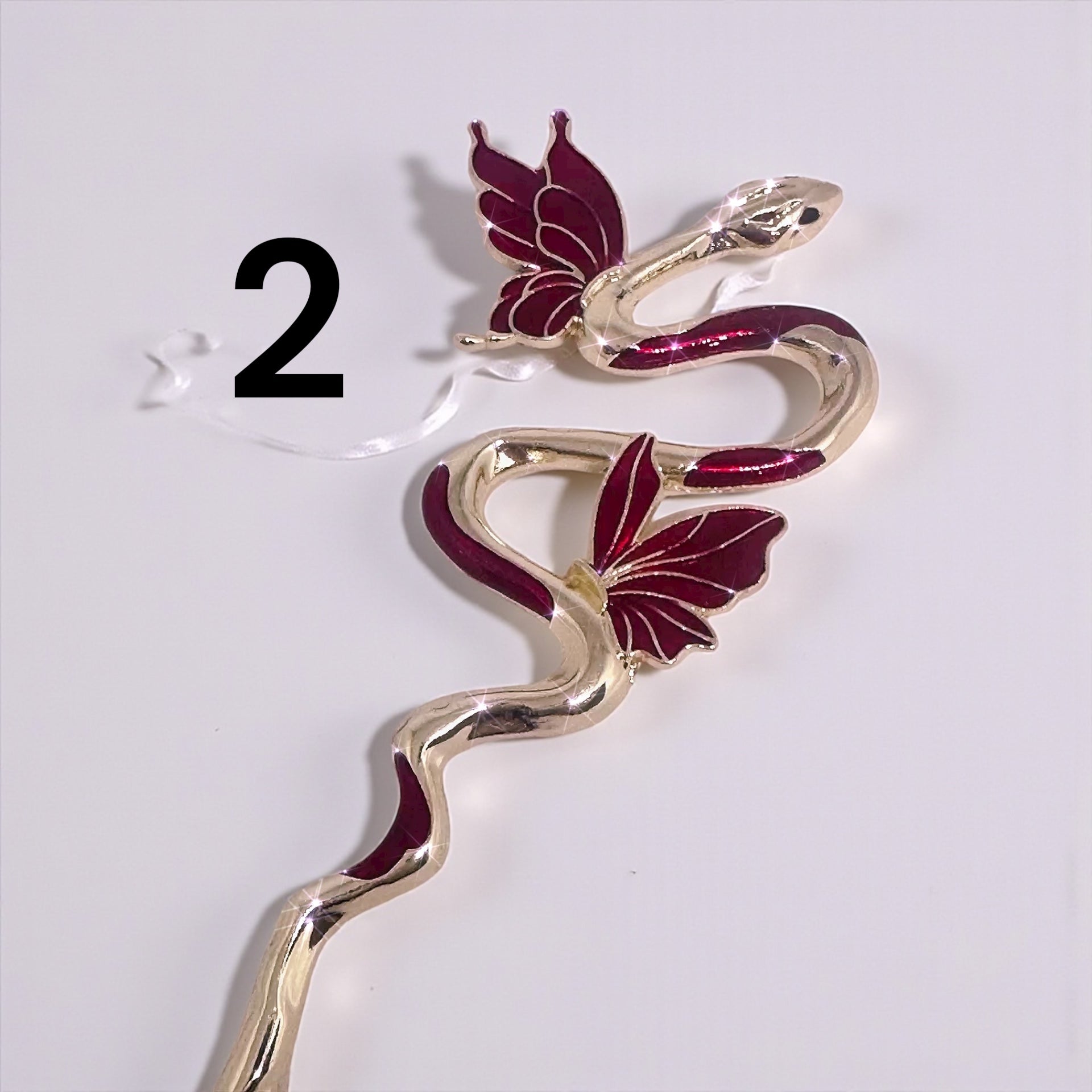 Elegant ATM Card Clip Tool showcasing a snake intertwined with flower motifs, ideal for jewelry enthusiasts.