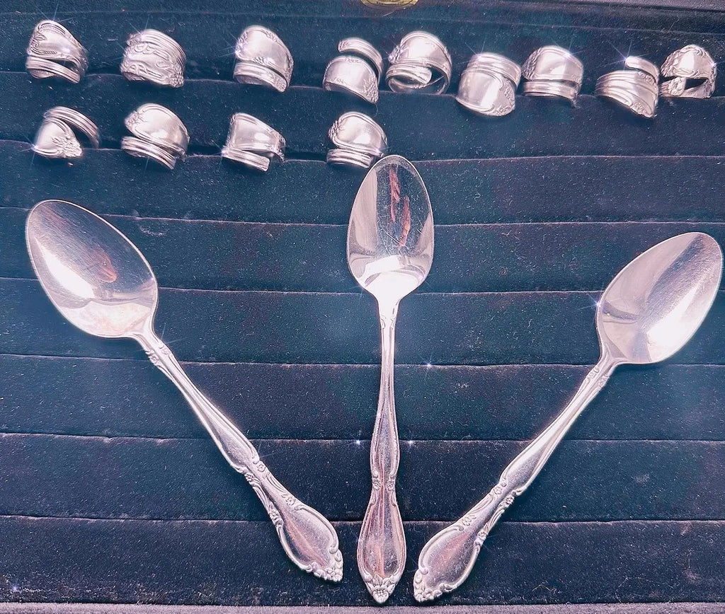 Custom Spoon Jewelry - Collection of silver spoons showcasing various shapes and styles, perfect for turning into personalized jewelry.