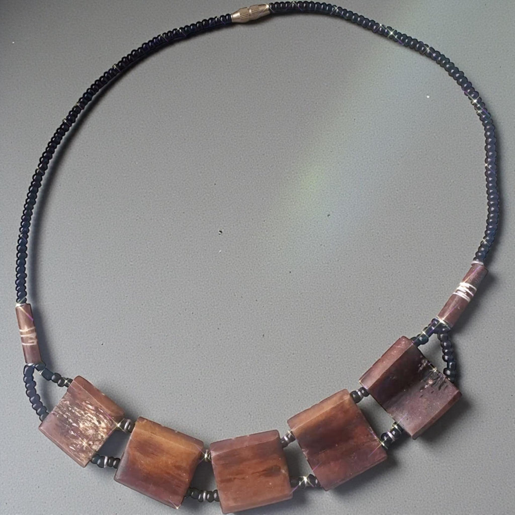 Carved Bone Sunburst Necklace • Boho Tribal Pendant, Black Seed Beads