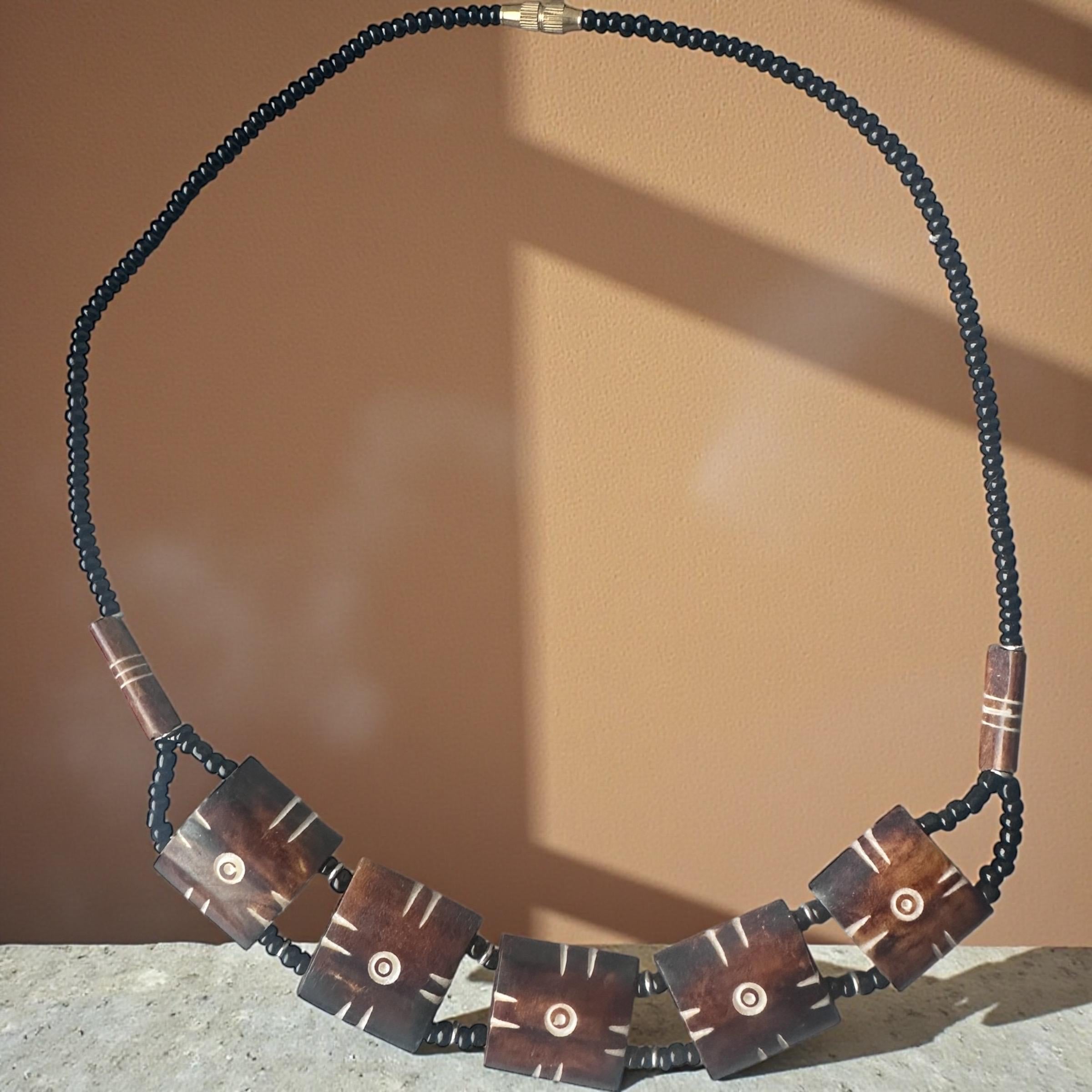 Carved Bone Sunburst Necklace • Boho Tribal Pendant, Black Seed Beads